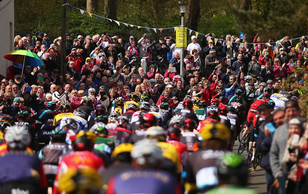 Fans cheer on the peloton during Stage 1 of the Tour of Yorkshire from Bridlington to Scarborough