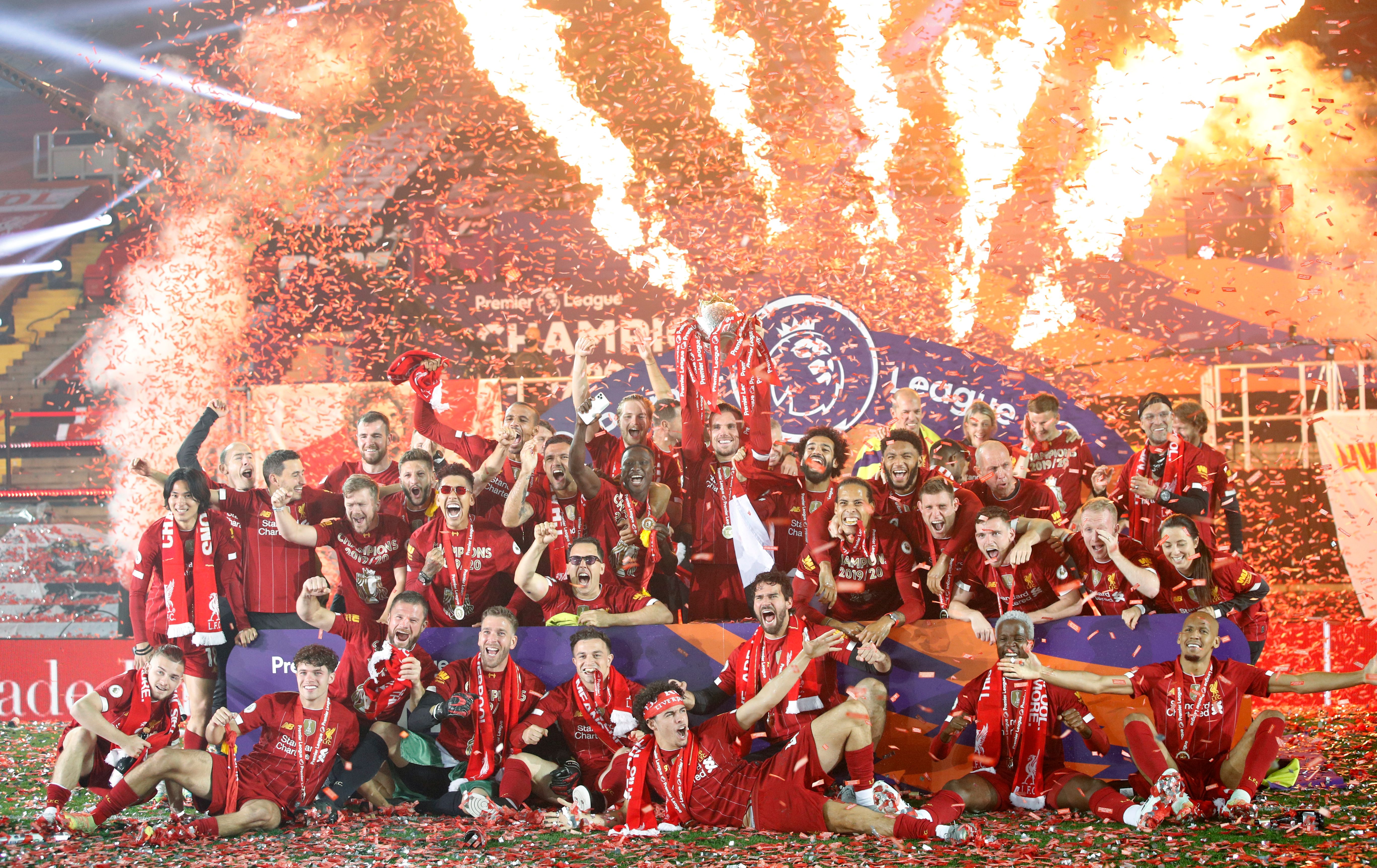 Liverpool celebrate their Premier League title at Anfield in July 2020, with no fans present due to Covid-19 restrictions.