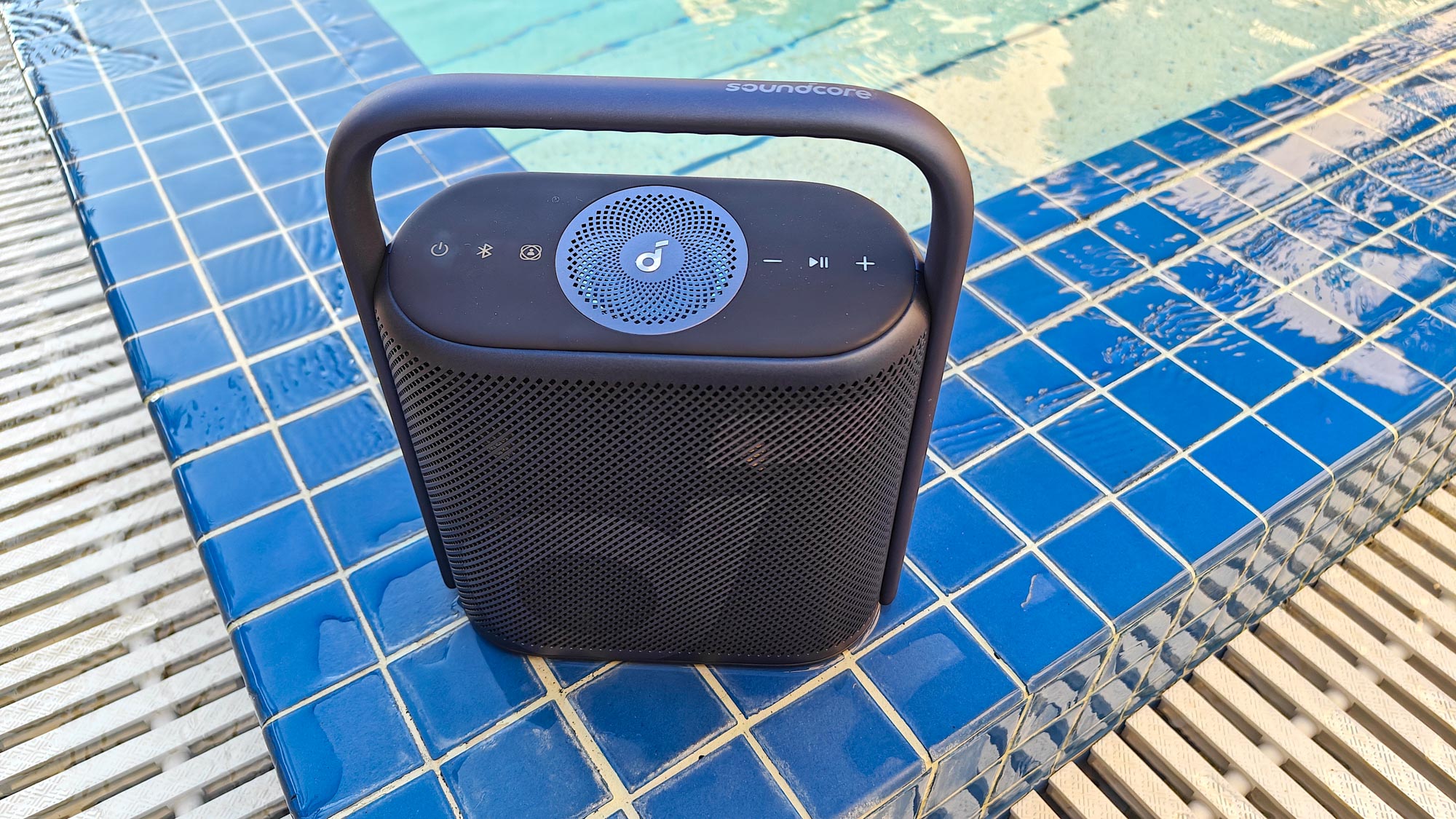 Soundcore Motion X500 by a pool