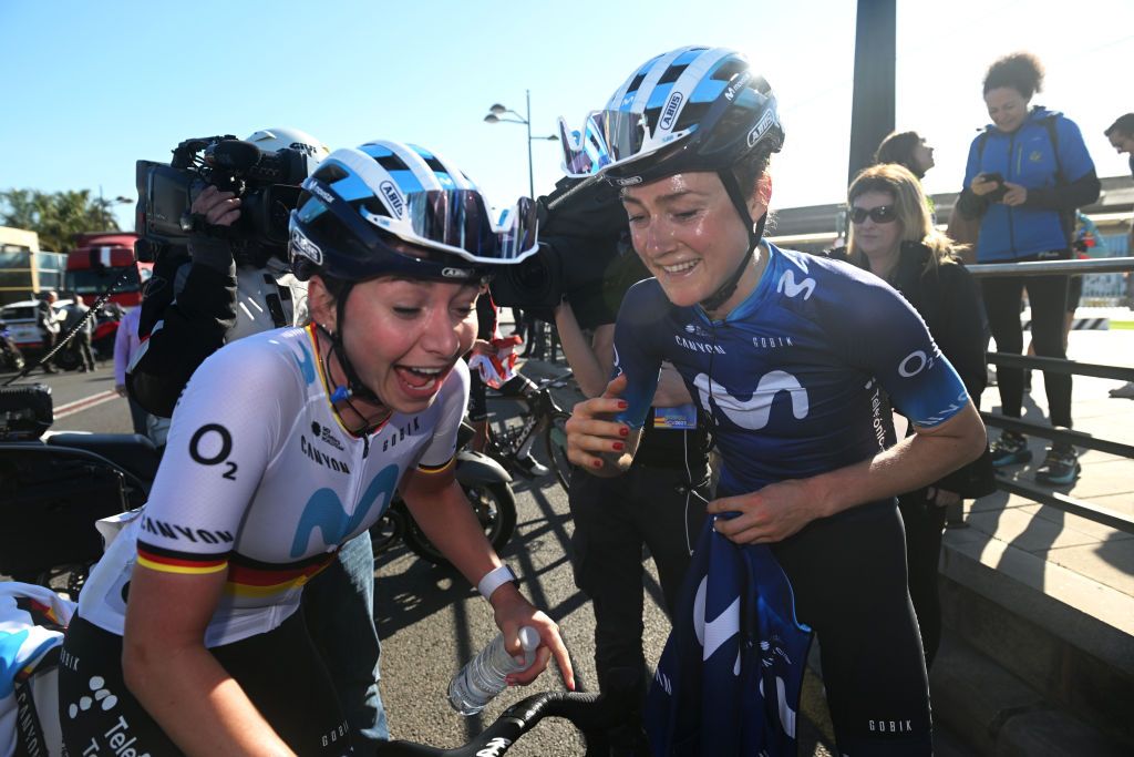 VALENCIA SPAIN FEBRUARY 05 LR On second place Liane Lippert of Germany and race winner Floortje Mackaij of The Netherlands and Movistar Team celebrate at finish line after the 5th VCV Fminas GP 2023 a 93km one day race from Paterna to Valencia on February 05 2023 in Valencia Spain Photo by Dario BelingheriGetty Images