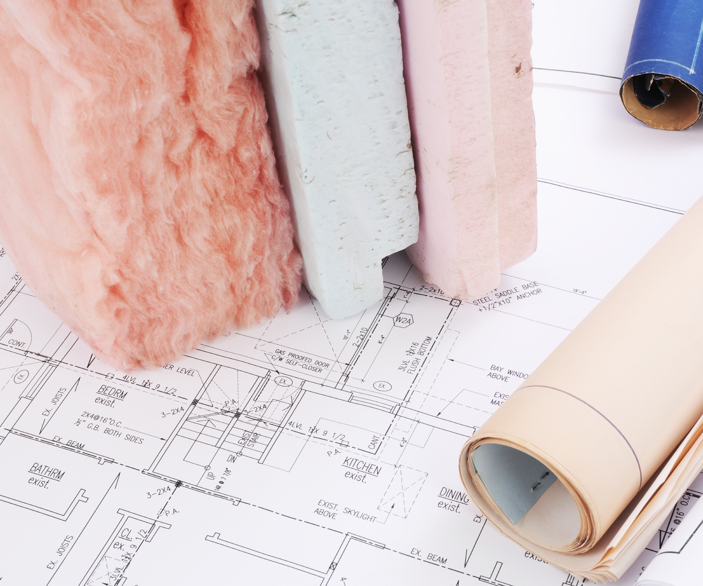 architectural plans with insulation stacked on top