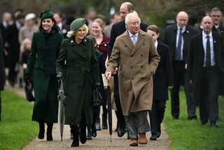 Kate Middleton wears a long green coat, matching hat, and tartan scarf to attend church at Sandringham on Christmas Day