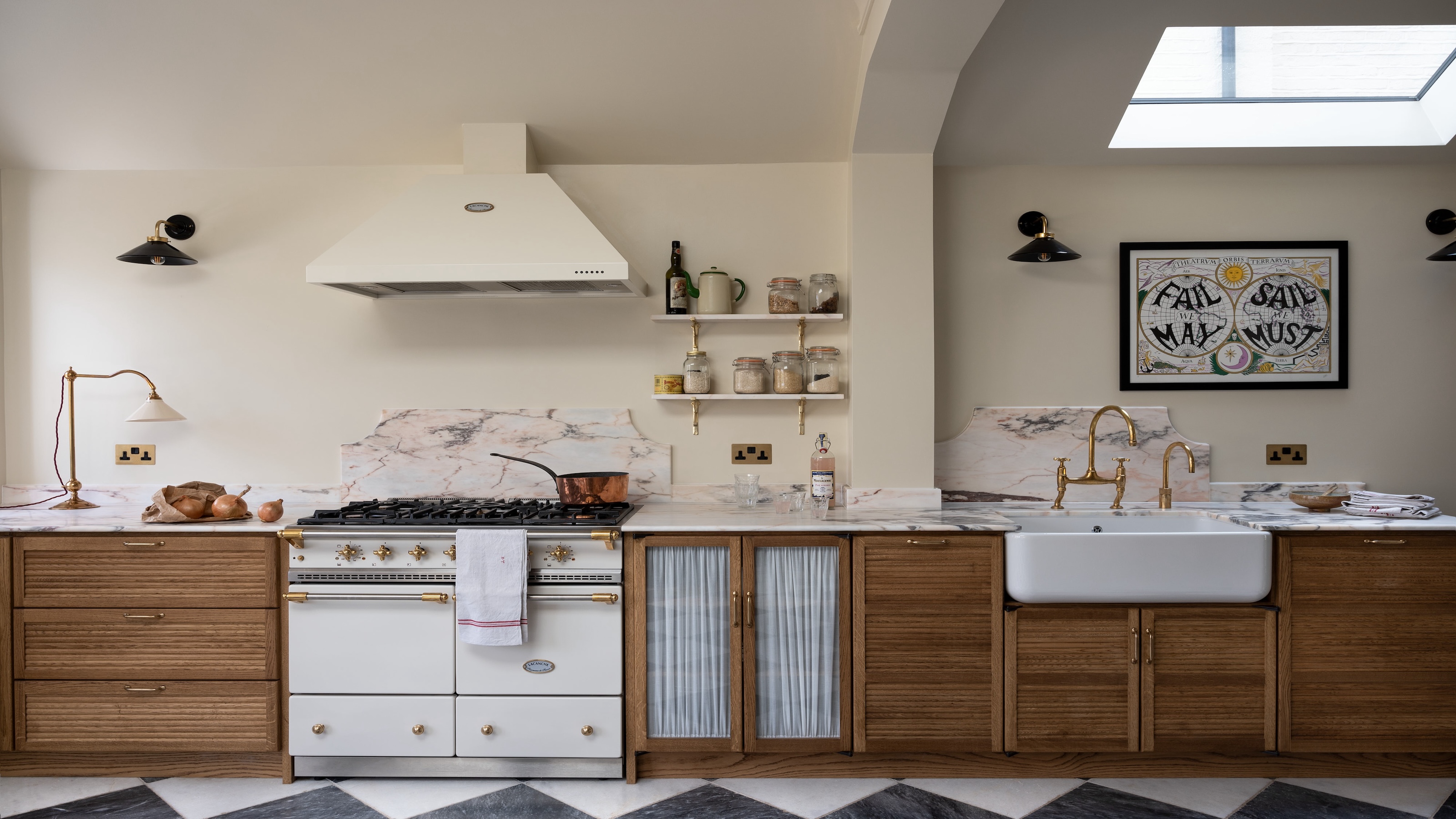 a dark wood kitchen with textured doors plus a big Belfast sink and white range cooker