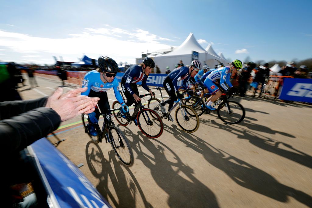 FAYETTEVILLE GEORGIA JANUARY 28 LR Ava Holmgren of Canada Gage Hecht of The United States and Matyas Fiala of Czech Republic compete during the 73rd UCI CycloCross World Championships Fayetteville 2022 Team Relay Fayetteville2022 on January 28 2022 in Fayetteville Georgia Photo by Chris GraythenGetty Images