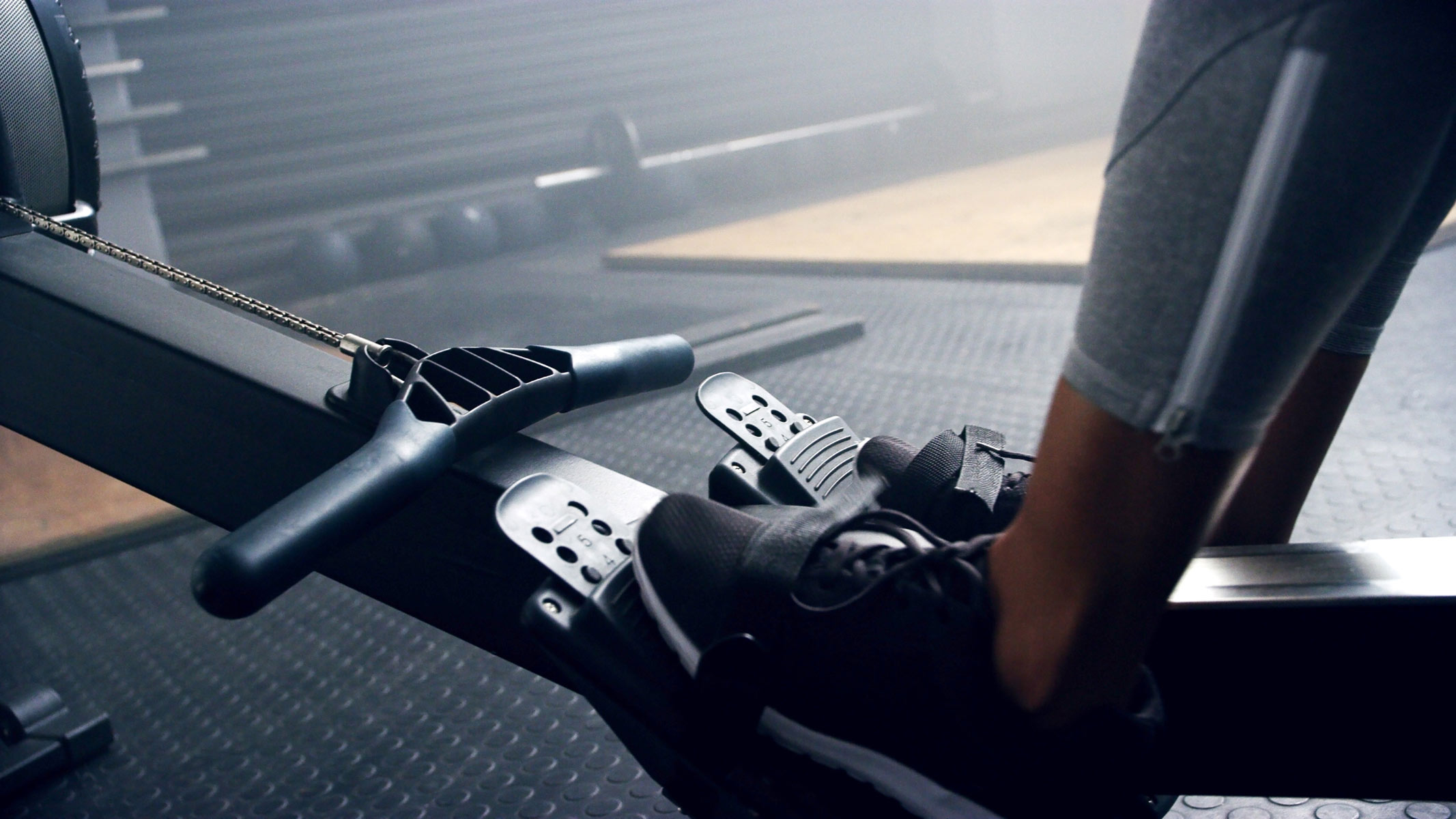 A close-up picture of footplates in a rowing machine