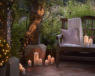 North-facing garden ideas with candles and fairy lighting