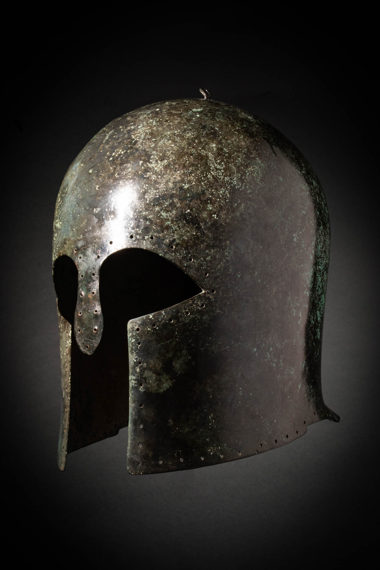 Angled photo of greek helmet.