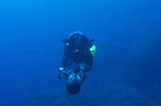 divers at the Antikythera shipwreck site