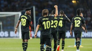Luka Modric celebrates scoring for Real Madrid against Celta Vigo at Balaidos.