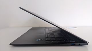 Samsung Galaxy Book2 Pro with the lid half-open, showing how thin the screen is.