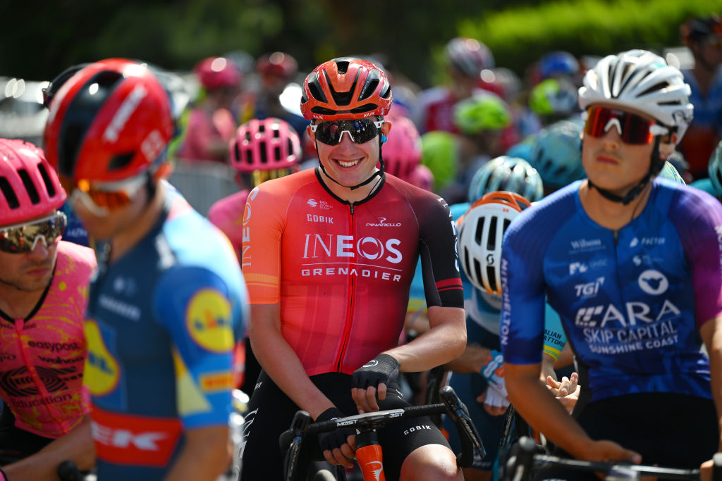 Leo Hayter smiles sat on his bike in a crowd