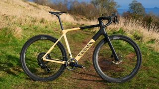 Canyon Grail CF SLX 8 AXS with a grass background