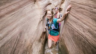 A woman canyoneering in Utah