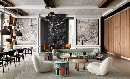 Puro lounge with sofas, chairs & large wall art