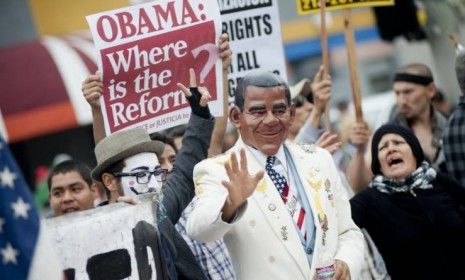 A May Day activist dressed as President Obama marches through downtown Los Angeles marking the International Worker&amp;#039;s Day on May 1