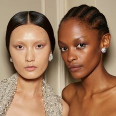 Two models with bright complexions.