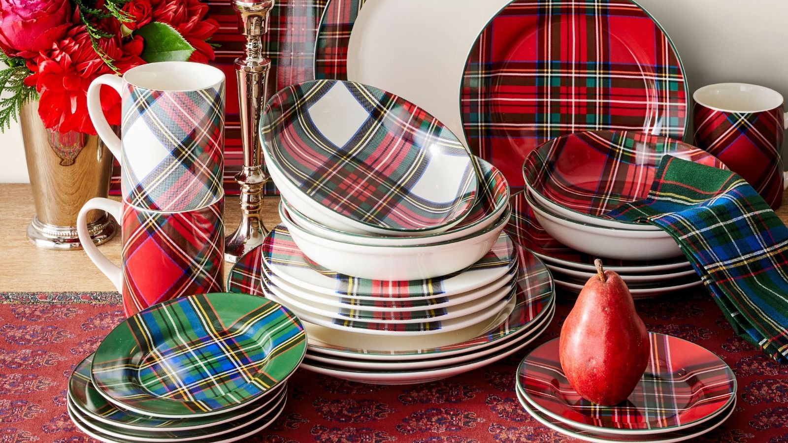 Stacks of white, green and red plaid dinnerware
