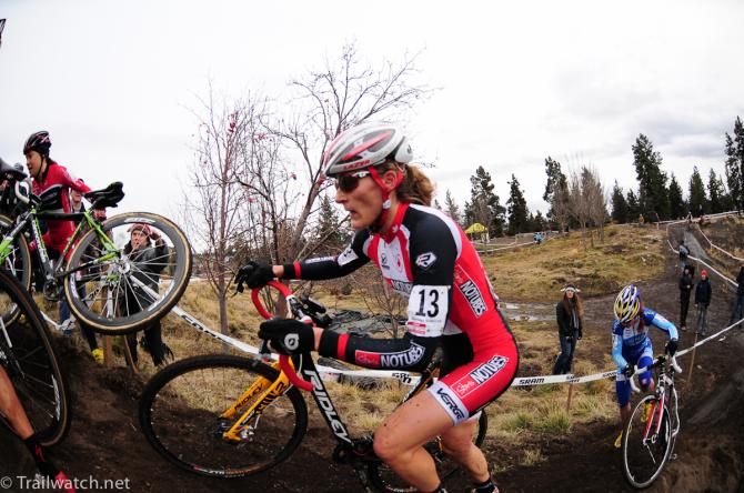 Canadian Champion Mical Dyck (NoTubes) forced off her bike by a crash ahead of her