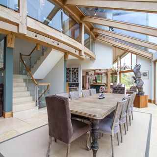 dining room with glass roof and staircase