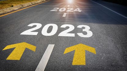 2023 to 2024 painted on roadway with up arrows for IRA RMD delay