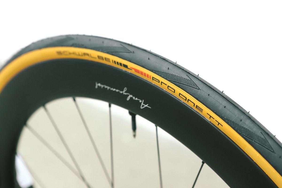 A tan bicycle tyre on a white background