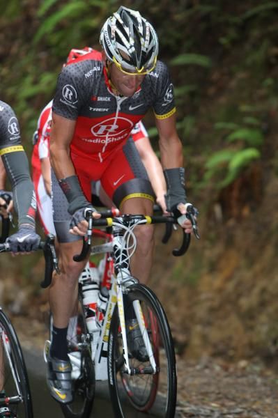 Lance looks lean... Armstrong keeps pace up the final climb of the day.