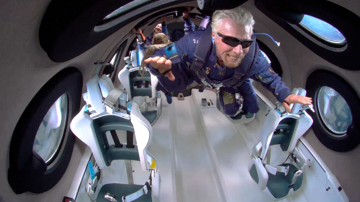 Virgin Galactic founder Richard Branson soars like Superman while in weightlessness during his spaceflight on Virgin Galactic&#039;s VSS Unity on July 11, 2021.