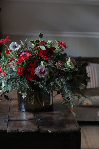 Christmas flower arrangement by Mcqueens Flowers
