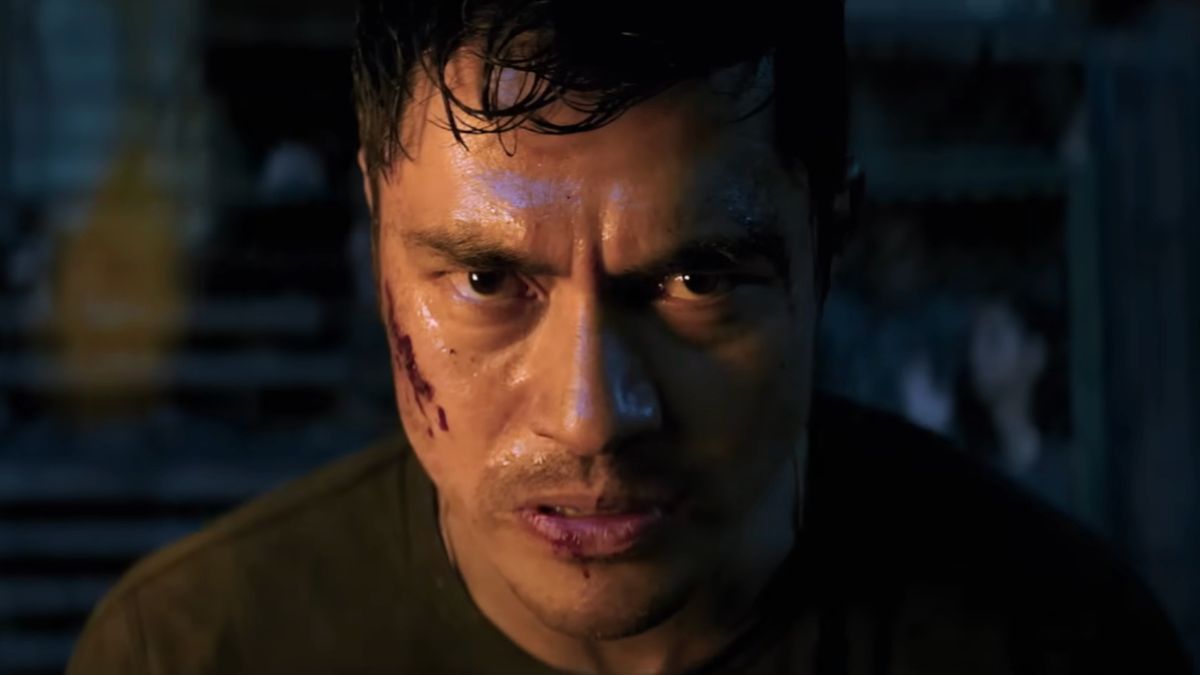 Henry Golding looking angry and beat up in Snake Eyes.