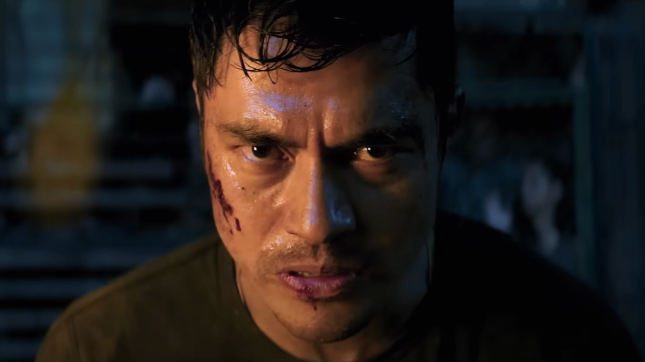 Henry Golding looking angry and beat up in Snake Eyes.