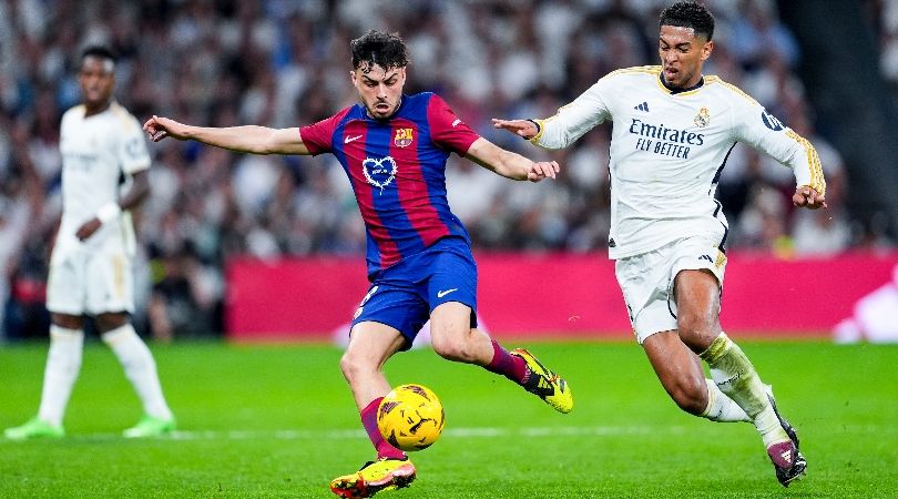 Barcelona&#039;s Pedri is challenged by Real Madrid&#039;s Jude Bellingham in a Clasico clash in LaLiga in April 2024.