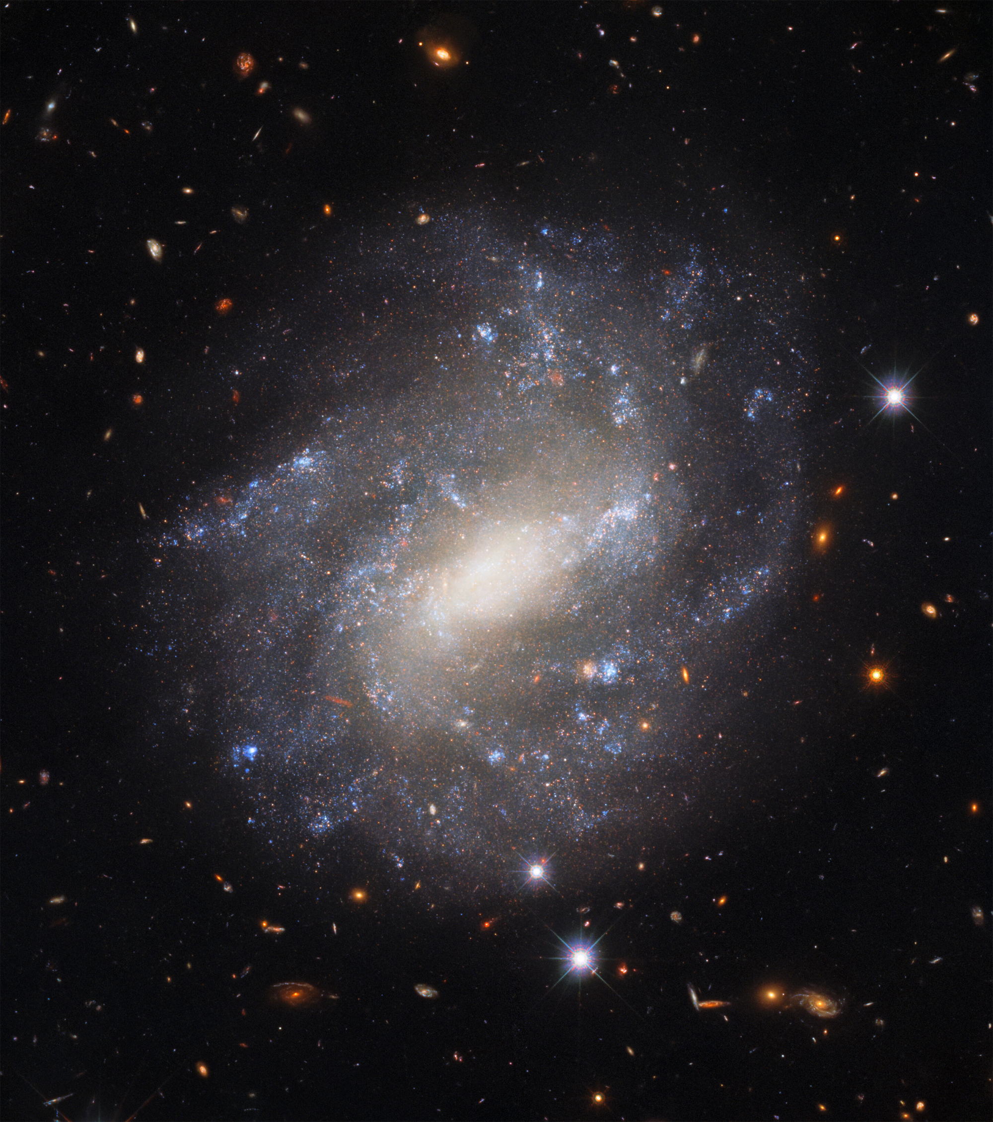 The spiral galaxy UGC 9391130 million light-years from Earth is seen by the Hubble Space Telescope's Wide Field Camera 3 in this image released Sept. 30, 2022.