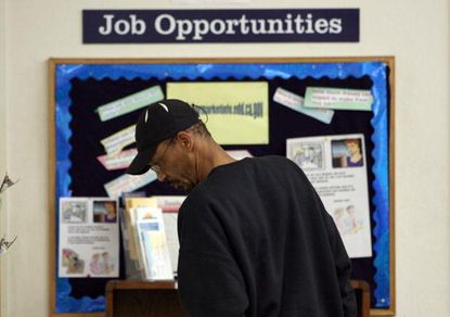 U.S. jobless claims fall to lowest level in 14 years