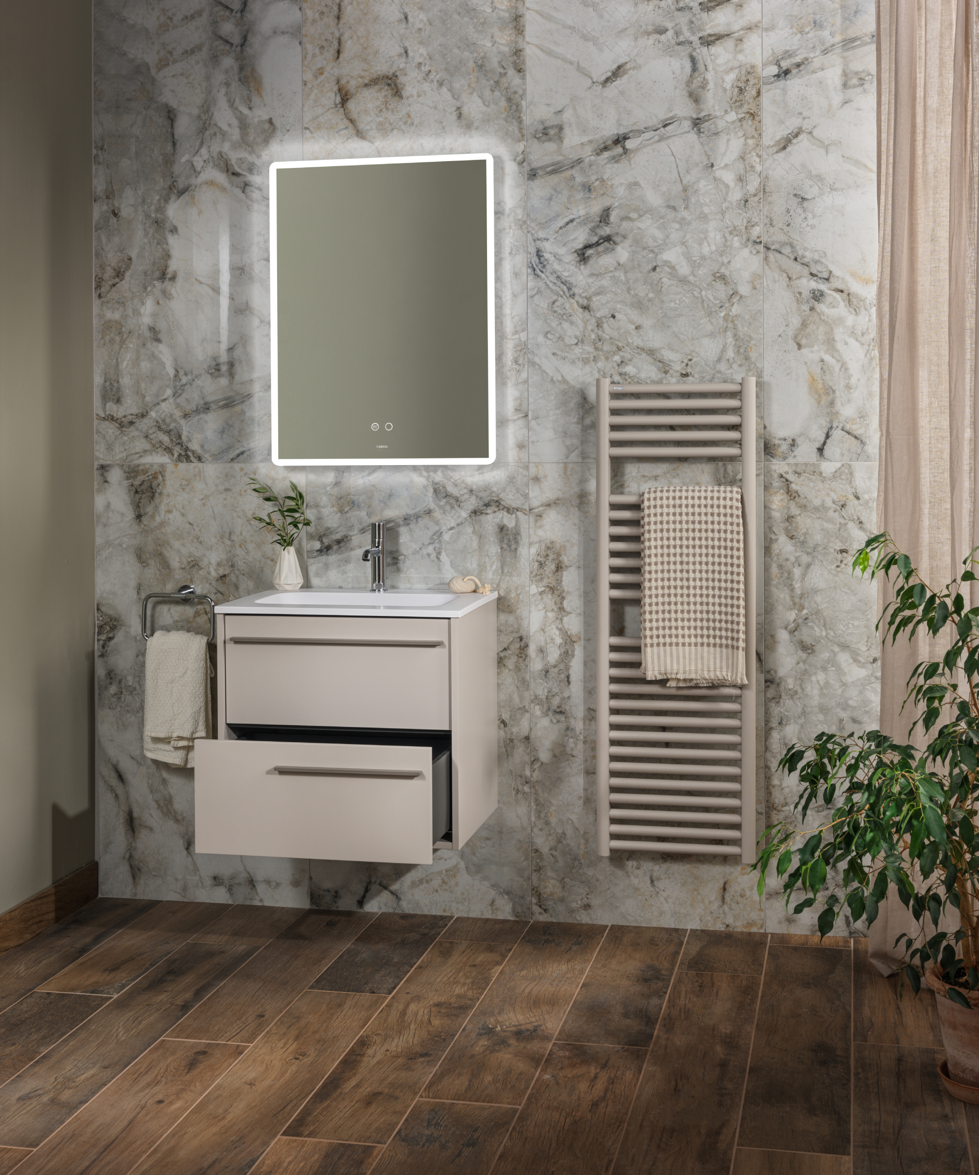 stone coloured towel rail in bathroom