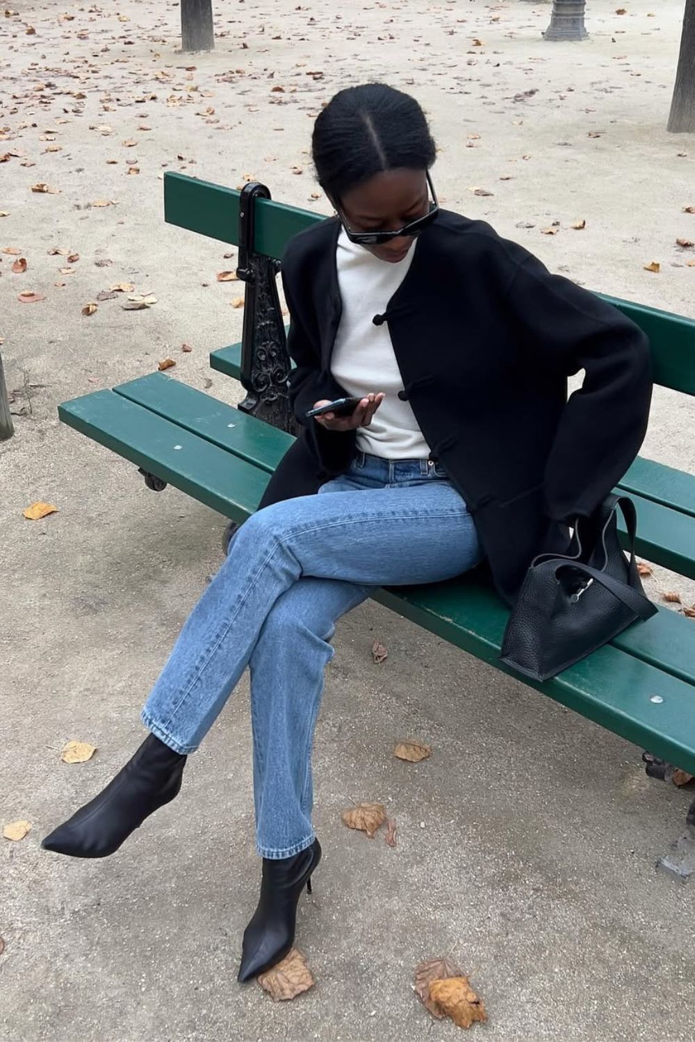 @sylviemus_ Black Boot Outfits wearing a black jacket, roll neck, jeans and heeled boots