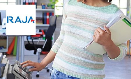 Woman holding raja office supplies while using the printer