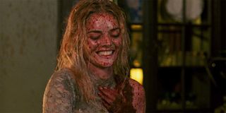 Samara Weaving laughing at the end of Ready Or Not