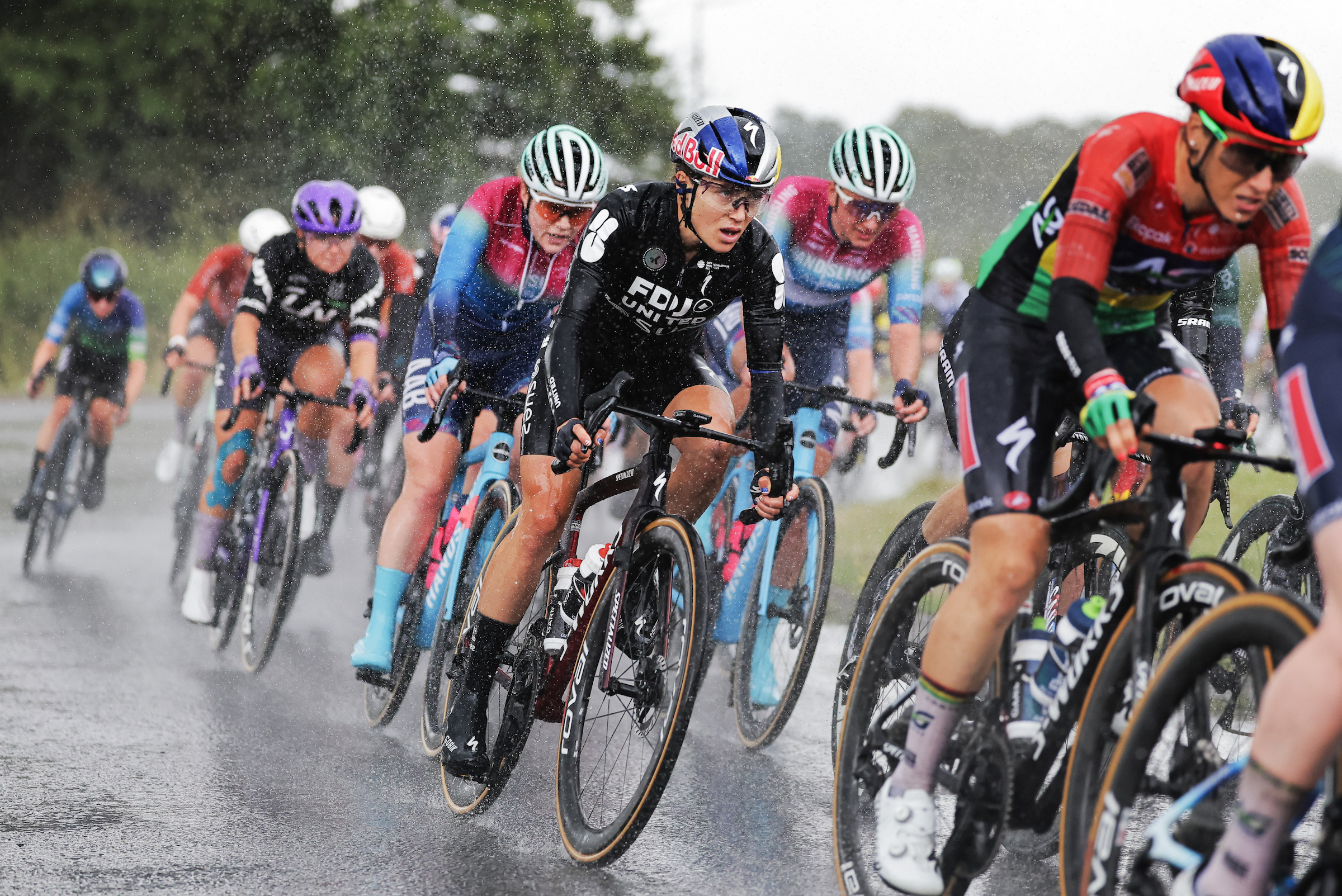 Kate Courtney racing through the rain in the peloton during stage 2 of the Tour of Britain Women