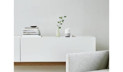 Google home on white sideboard