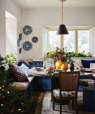 A dining nook decorated for Christmas