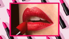 Woman applying red lipstick, close up, against a background of repeating lipsticks