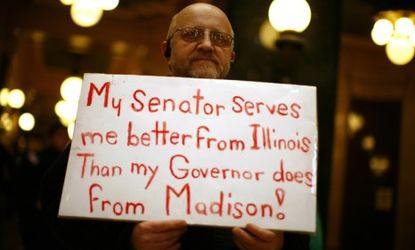 Protests continue in Madison, Wis., as state Democrats boycott a vote on anti-union legislation proposed by Gov. Scott Walker (R-Wis.).