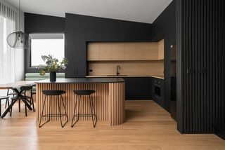 A kitchen with wooden accents