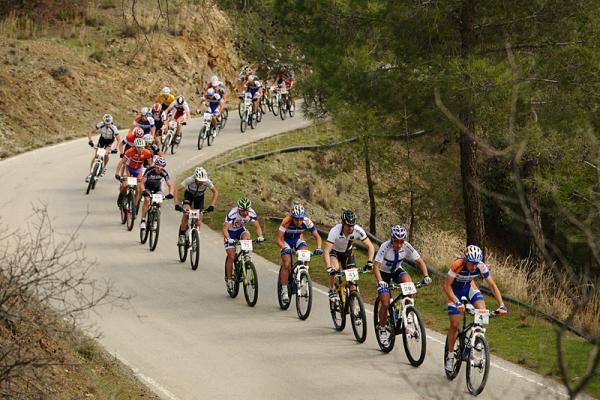 The men all strung out at the start of stage 2
