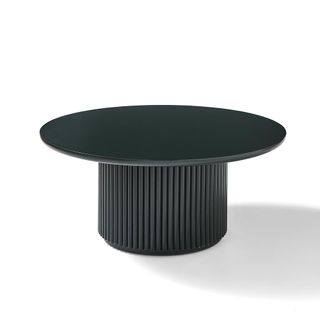 Ribbed black coffee table by designer Henry Holland