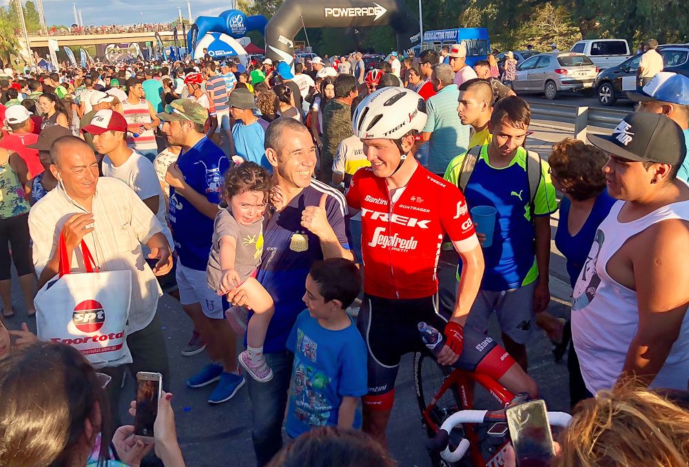 Greg Daniel interacts with fans after the final stage of Vuelta a San Juan