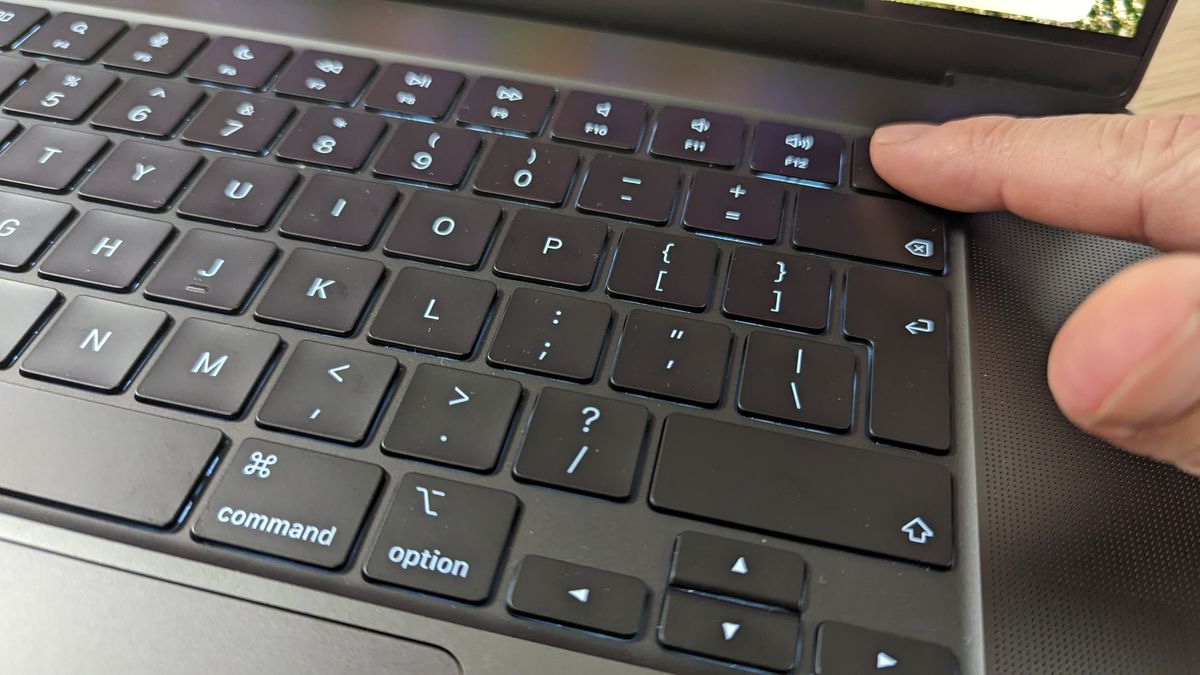 MacBook Pro 16-inch with screen open in an office