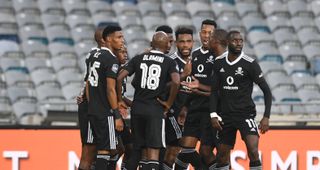 Fortune Makaringe of Orlando Pirates celebrates his goal with teammates