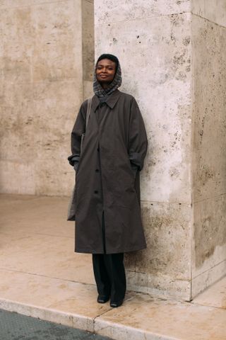 woman wearing a hooded rain coat