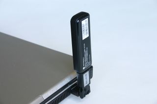 Need to jam that notebook or desktop into a tight space? The Motorola dongle also includes a Belkin hinge adapter.